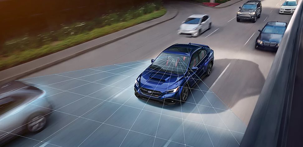 Diagram of WRX EyeSight Driver Assist Technology sensors monitoring the road for Pre-Collision Braking and lane detection
