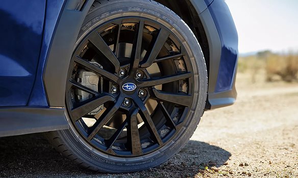 Close-up of the 2026 Subaru WRX multi-spoke alloy wheel and performance brake caliper