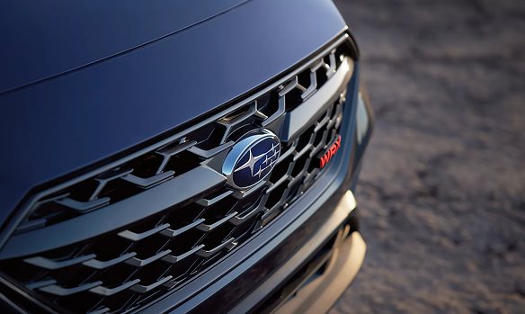 Close-up of the 2026 Subaru WRX LED headlight assembly and front grille design