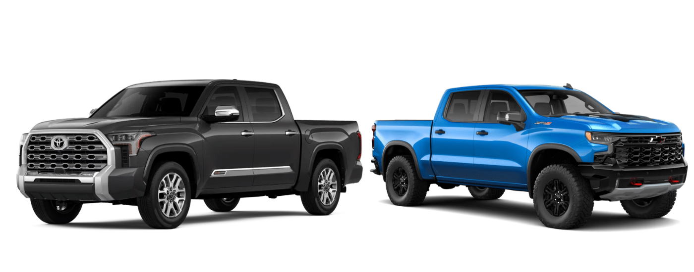 Black 2026 Toyota Tundra 1794 Edition parked next to a blue 2026 Chevy Silverado 1500