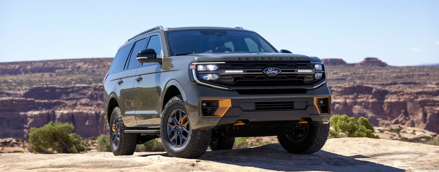 Green 2026 Ford Expedition parked off-road.