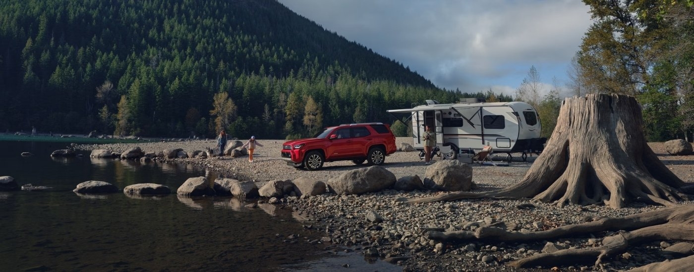 Red 2026 Toyota 4Runner Limited parked near a lake