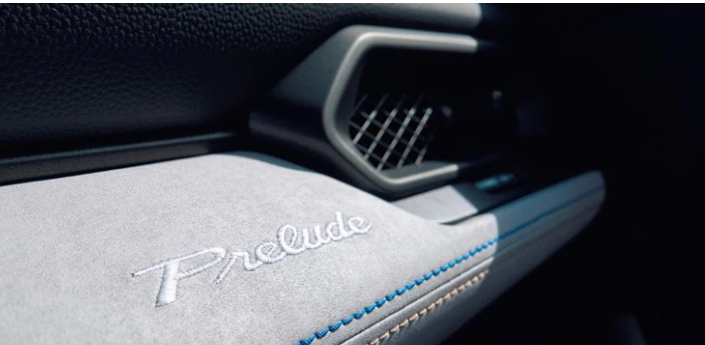 Close-up of a 2026 Honda Prelude showing a textured dashboard.