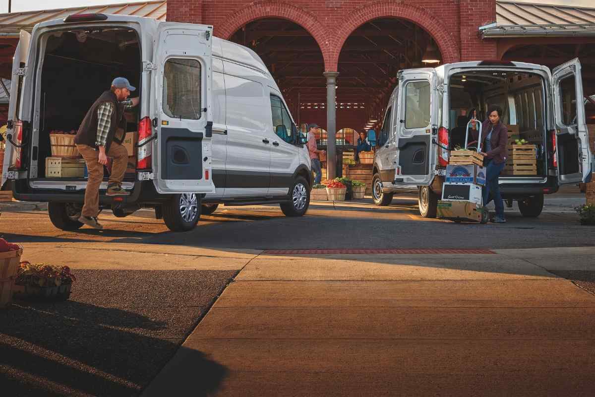 Small business owners using Ford Transit cargo vans for inventory transportation and daily operations.