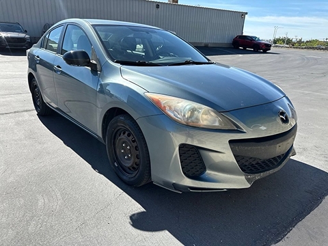 a blue 2013 used mazda3 at the Bountiful Mazda dealership in Bountiful, UT