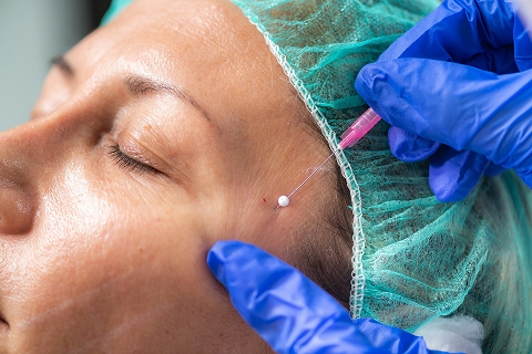 a person getting a medical procedure at a medical spa in Bountiful, UT