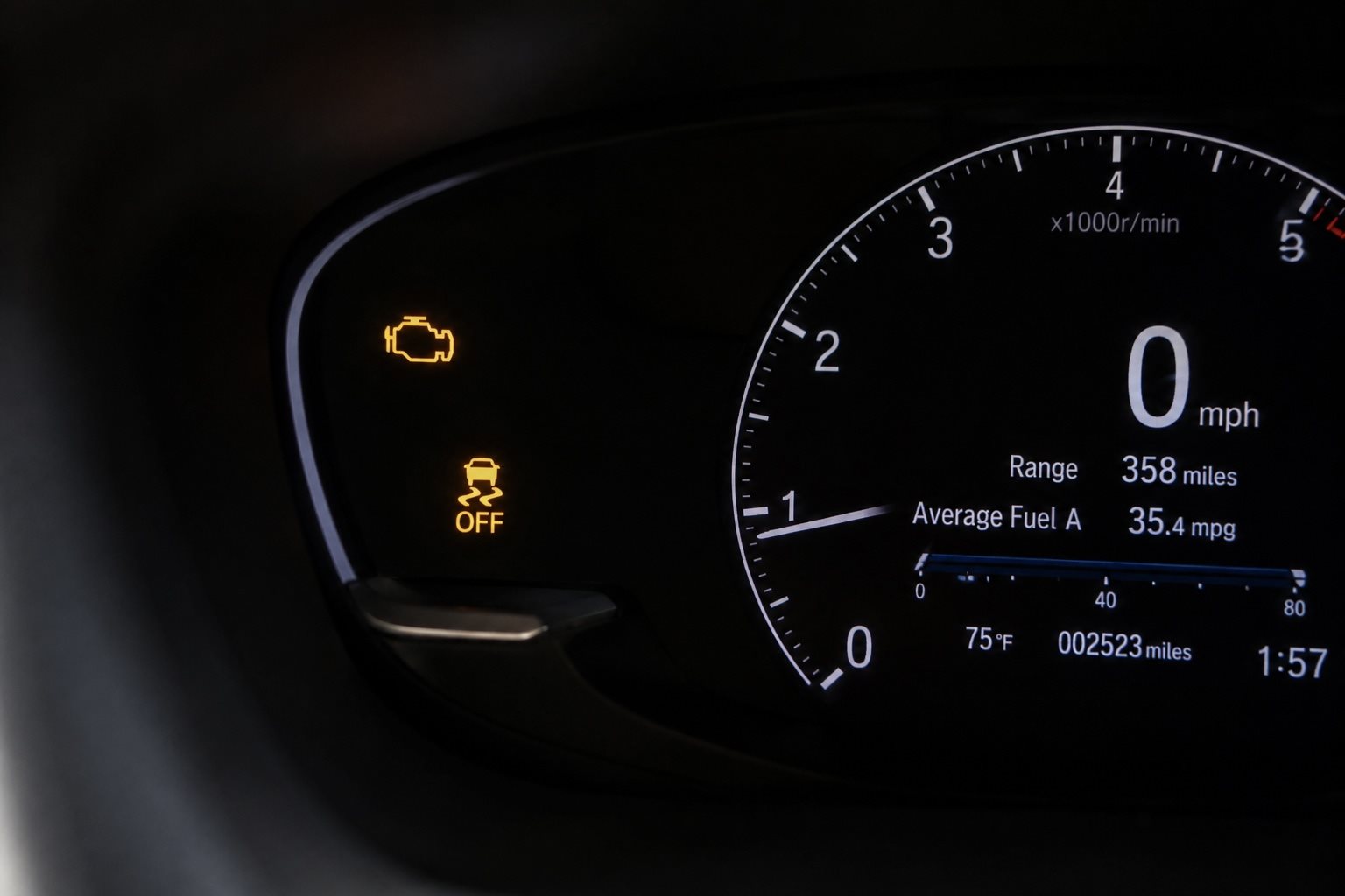 Honda amber check engine and VSA warning lights illuminated on instrument cluster