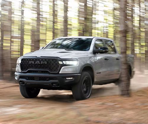 2026 Ram driving in the woods