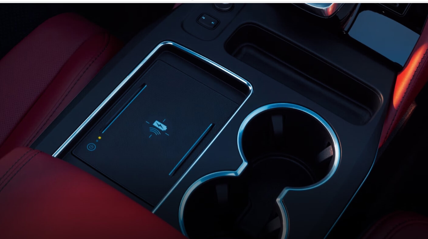 Close-up shot of Acura MDX wireless charging pad.
