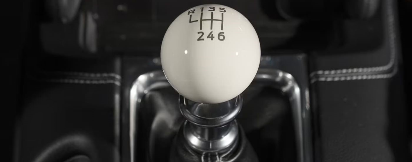 White manual shift knob in a 2023 Ford Mustang