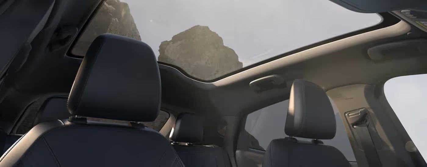 The black headrest and moonroof are shown in a 2023 Ford Mustang Mach-E.
