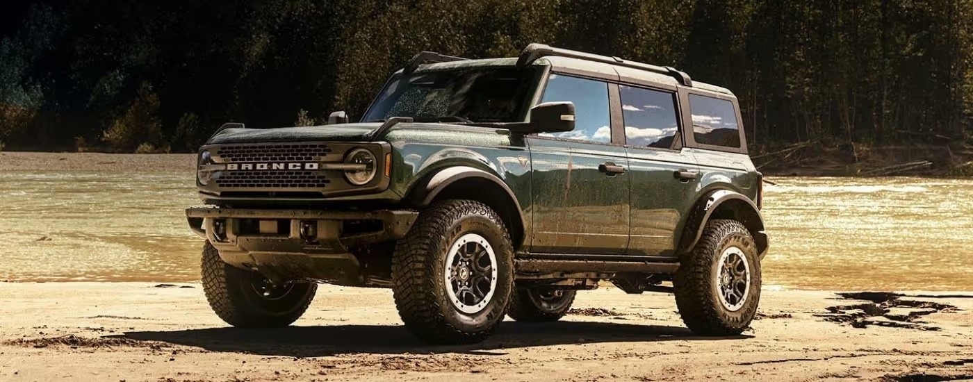 Green 2024 Ford Bronco Badlands for sale in Atlanta parked at an angle