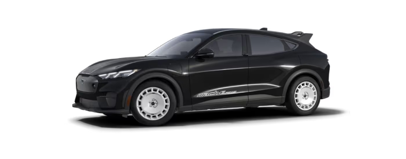 A black 2024 Ford Mustang Mach-E Rally angled left.