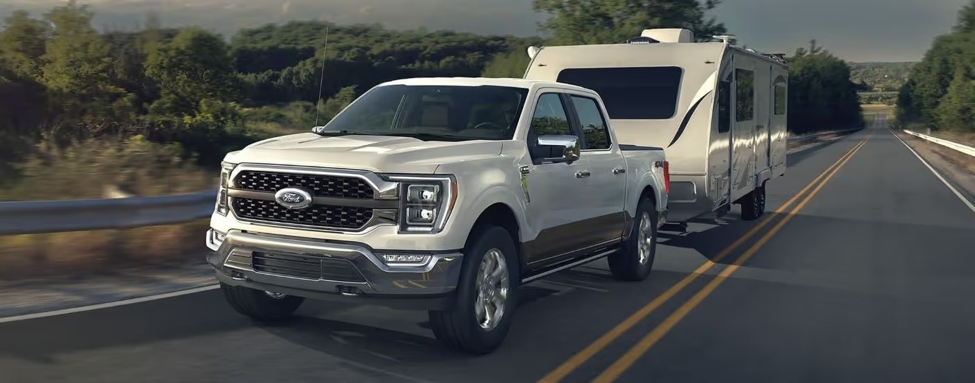 White 2022 Ford F-150 for sale near Atlanta towing a camper