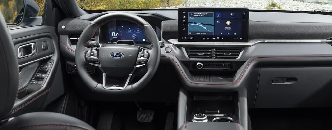 The gray interior and dash are shown in a 2025 Ford Explorer ST.