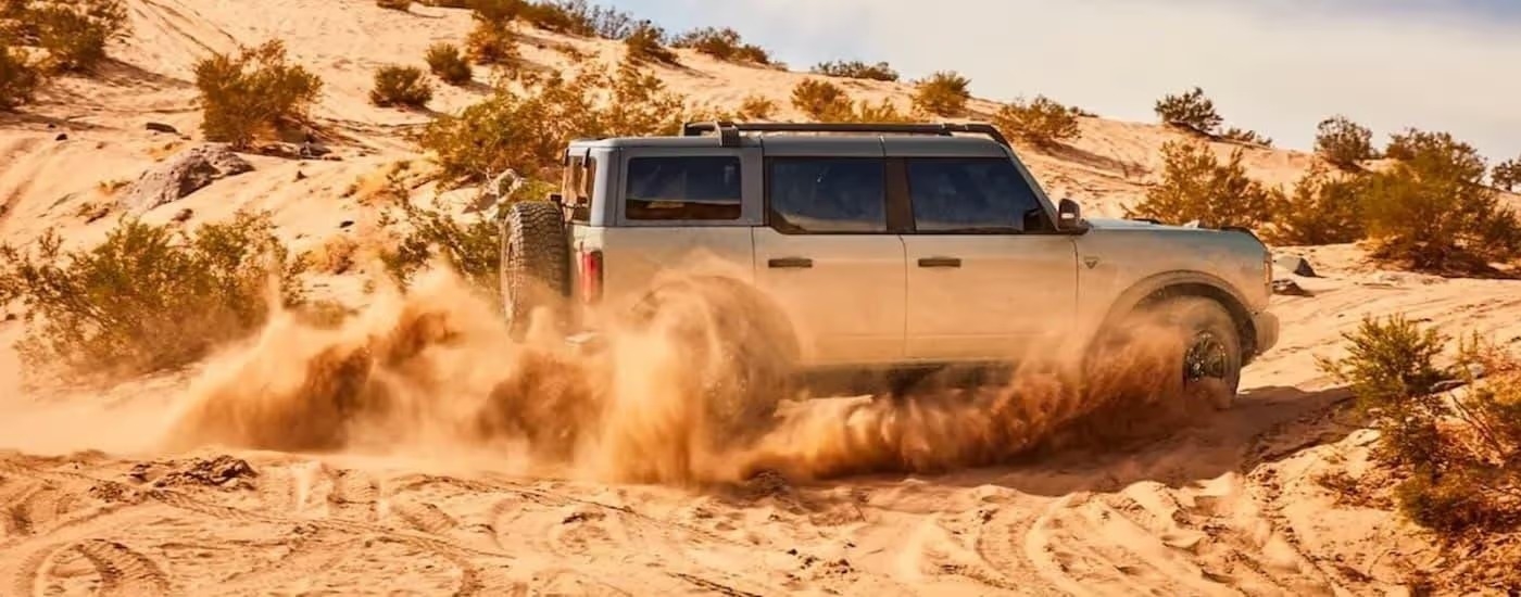 A silver 2025 Ford Bronco from the side.