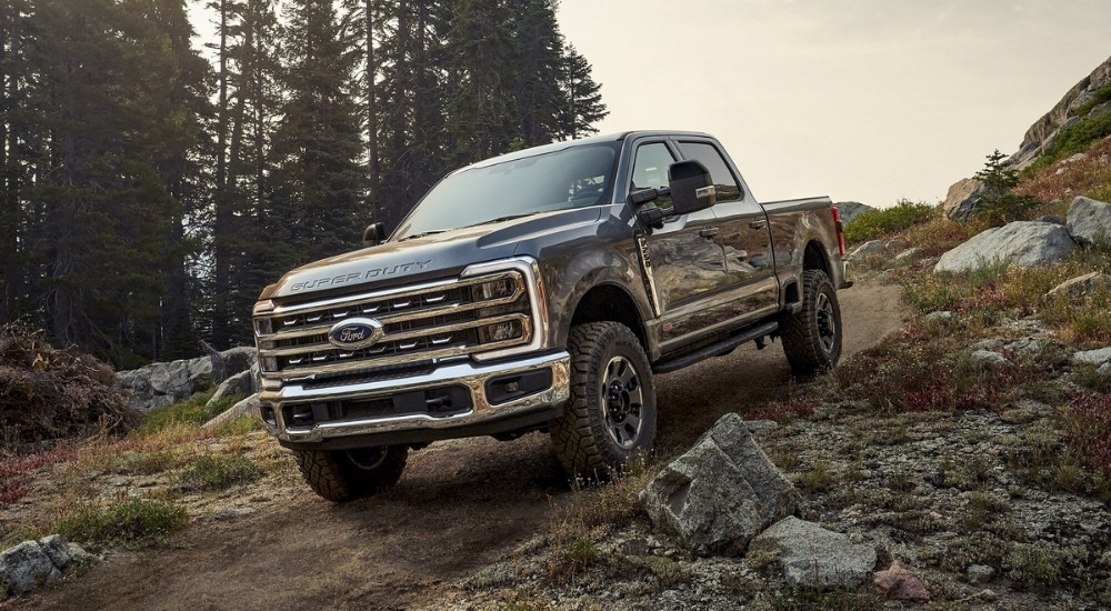Grey 2023 Ford F-250 Tremor driving off-road