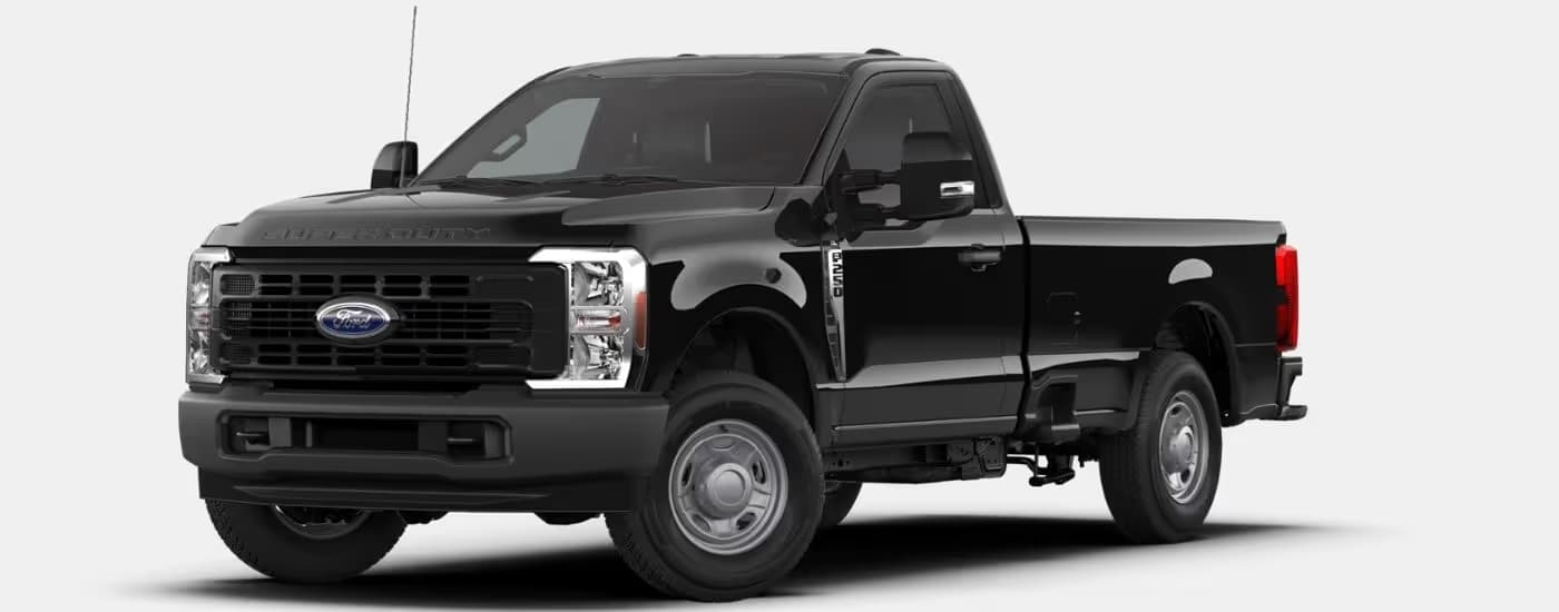 A black 2025 Ford F-250 angled left.