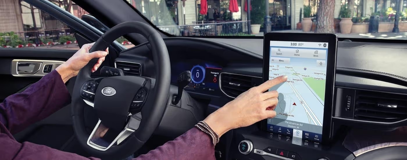 The black interior of a 2023 Ford Explorer King Ranch is shown from the passenger seat.