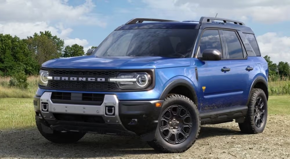 Blue 2026 Ford Bronco Sport parked in a field