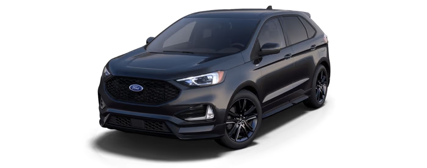 A black 2024 Ford Edge ST-Line angled left.