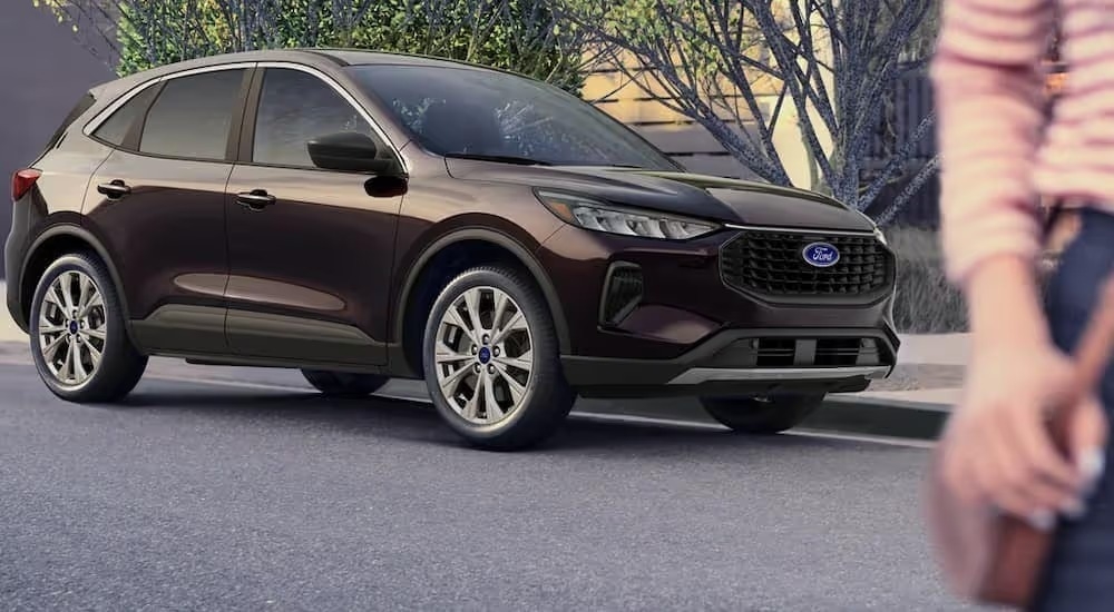 A purple 2023 Ford Escape is shown from the front at an angle.