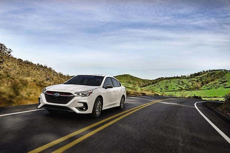 Subaru Legacy Driving Down a Rural Road Centennial Subaru Las Vegas NV