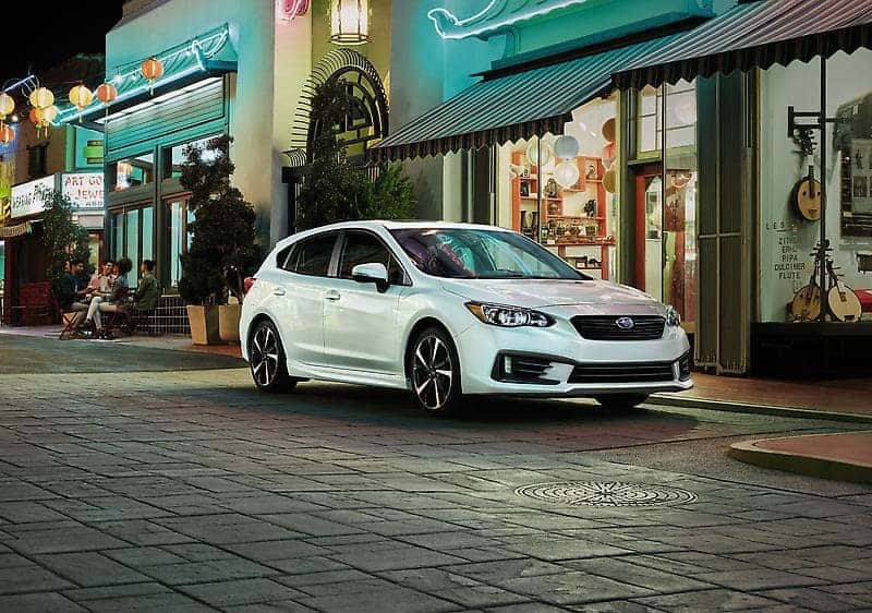 Subaru Impreza Parked on a City Curb at Night Centennial Subaru Las Vegas NV