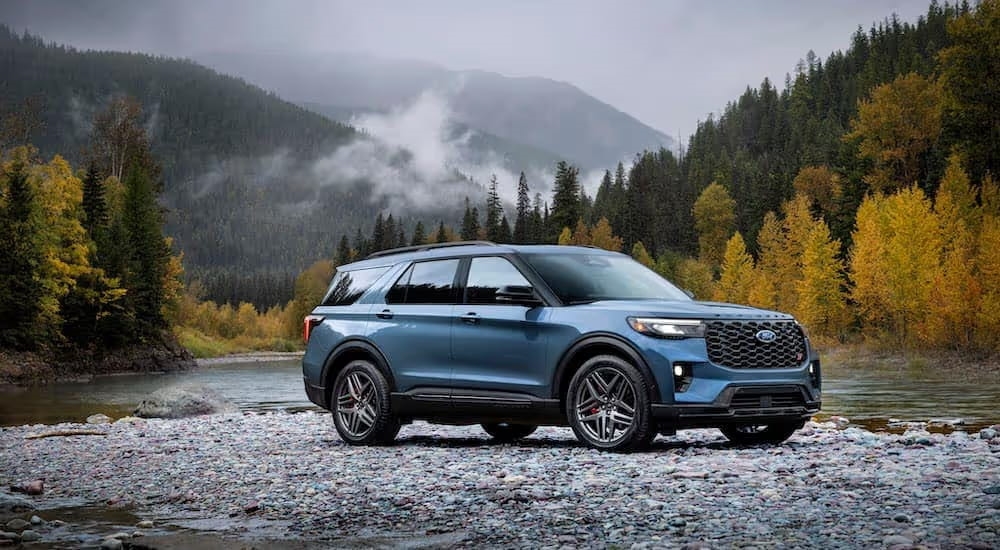 A blue 2025 Ford Explorer ST is shown from the side after leaving a Ford dealer near Smyrna.