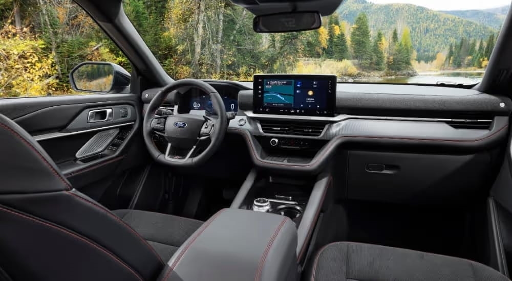 The black interior of a 2025 Ford Explorer ST is shown.