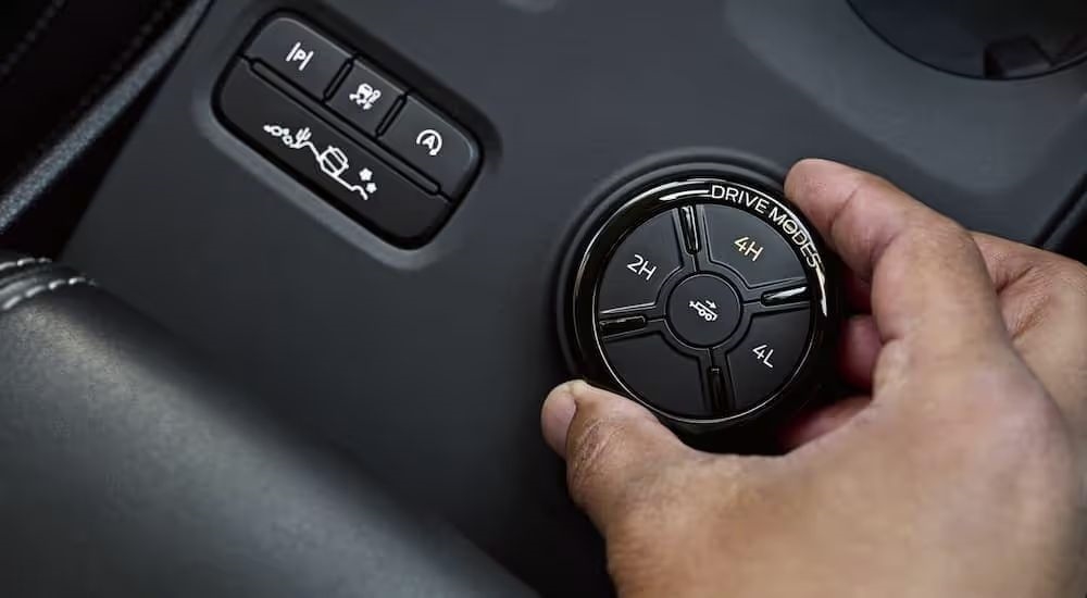 A person turning the Drive Mode knob in a 2024 Ford Ranger.