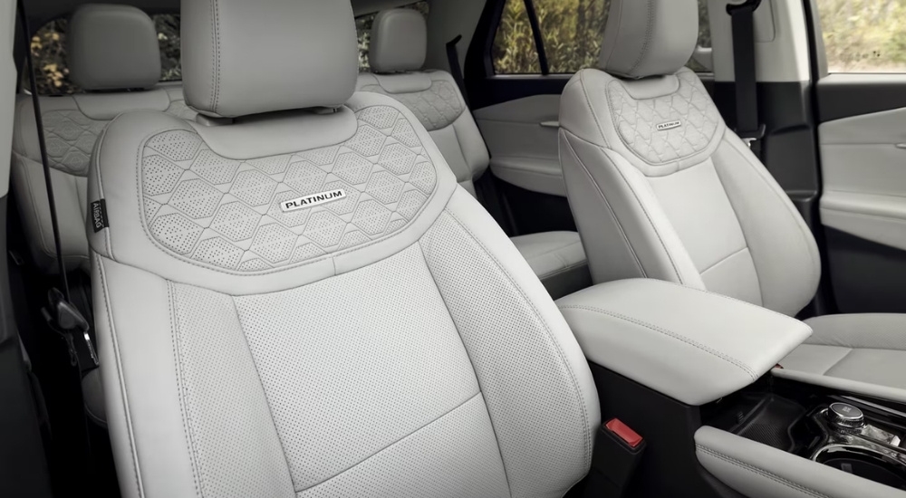 White leather stitched interior of the 2025 Ford Explorer Platinum.