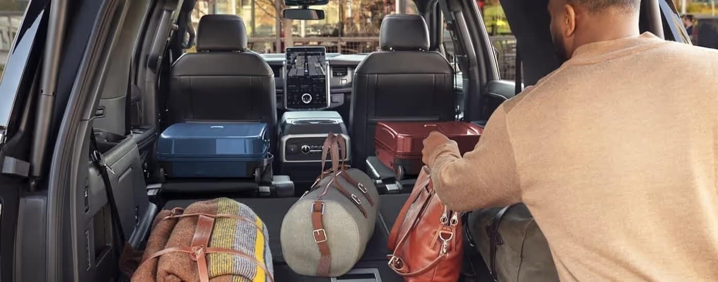 Luggage being stored in the cargo area in a 2023 Ford Expedition.
