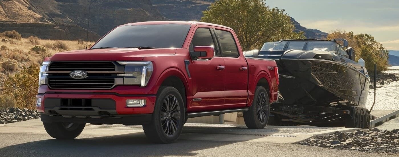 A red 2025 Ford F-150 for sale near Roswell from the front.