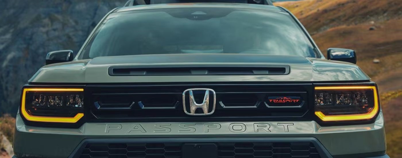 Close up of the grille on a green 2026 Honda Passport TrailSport.