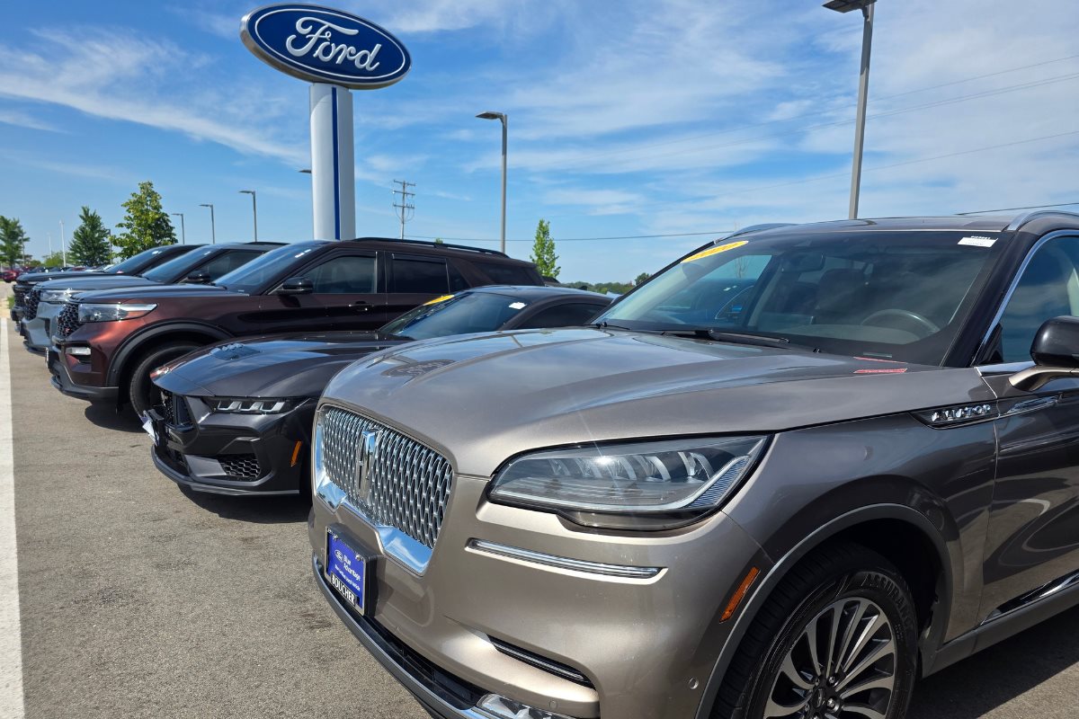 Variety of used SUVs and cars displayed on the Boucher Ford Kenosha dealership lot.
