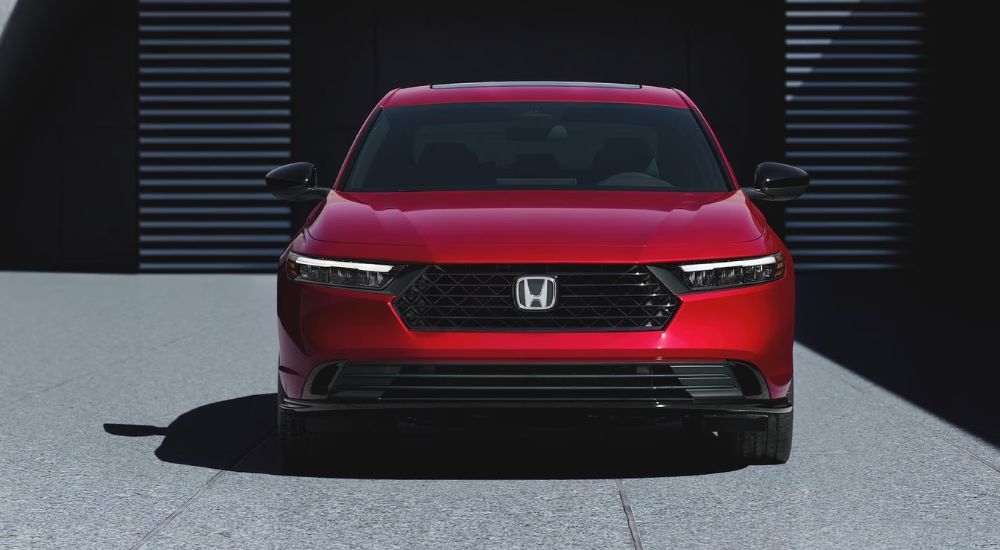 Red 2026 Honda Accord front view close up.