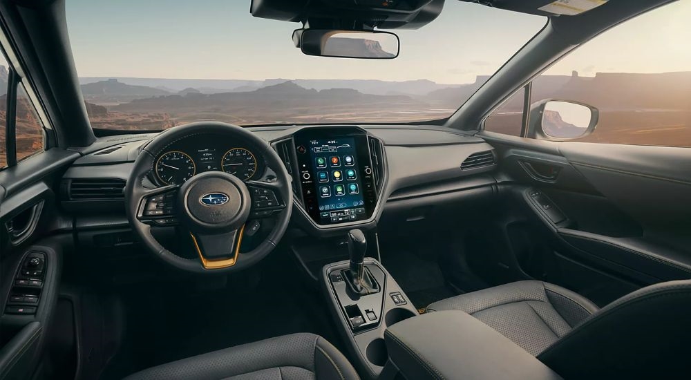 Infotainment display and steering wheel on a 2026 Subaru Crosstrek Wildnerness.