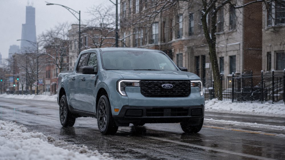 Ford Maverick driving on a salted Chicago street in winter