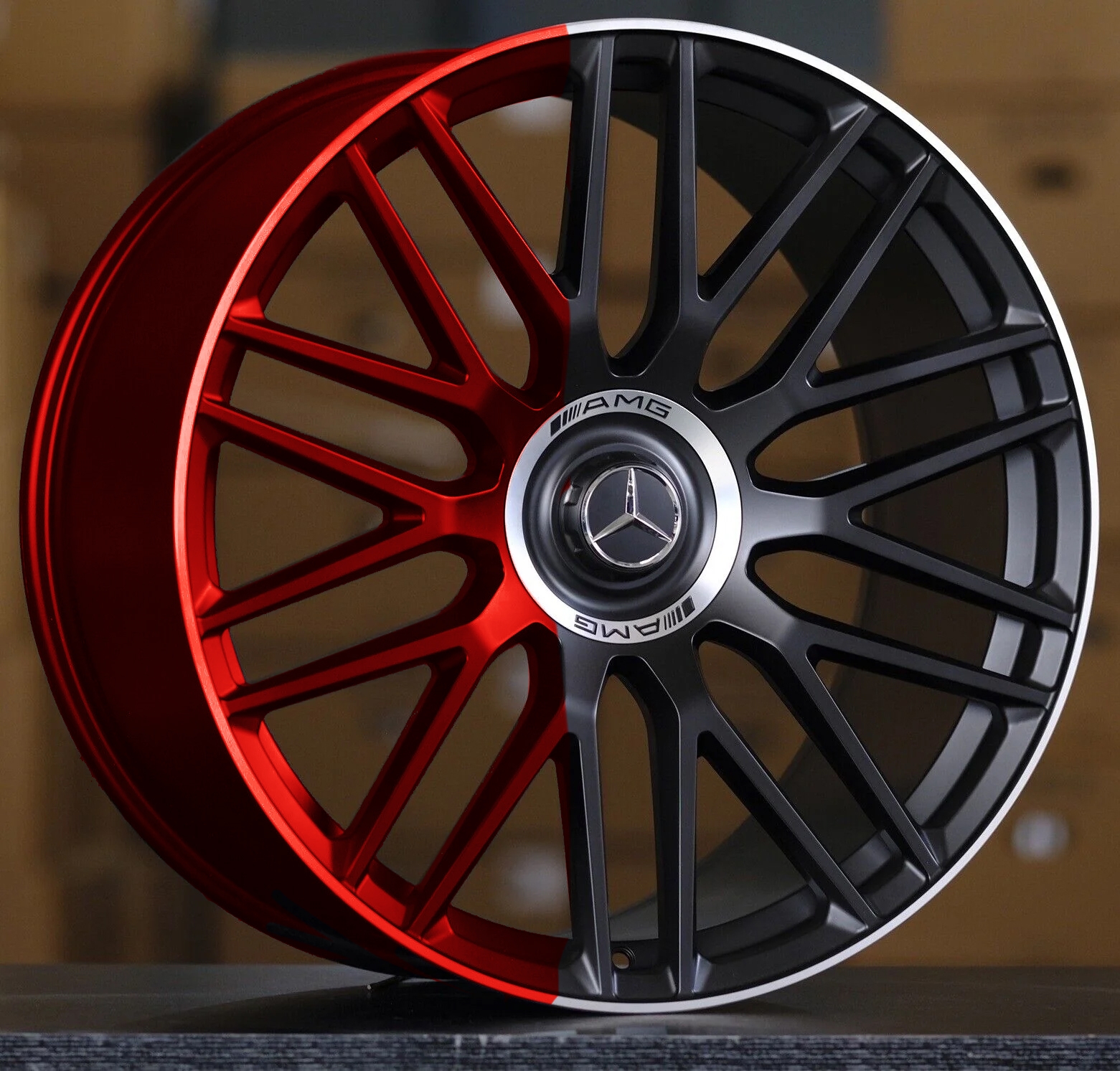 Alloy wheel partway through a color change during painting at Feldmann Imports in Bloomington, MN