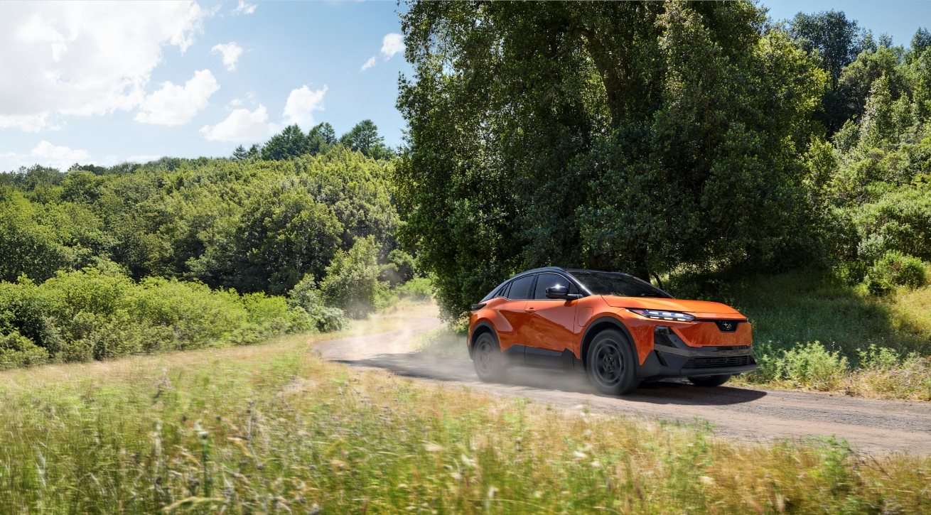 Subaru Uncharted all-electric SUV driving on a dirt road
