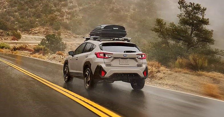 A Subaru hybrid vehicle on the road