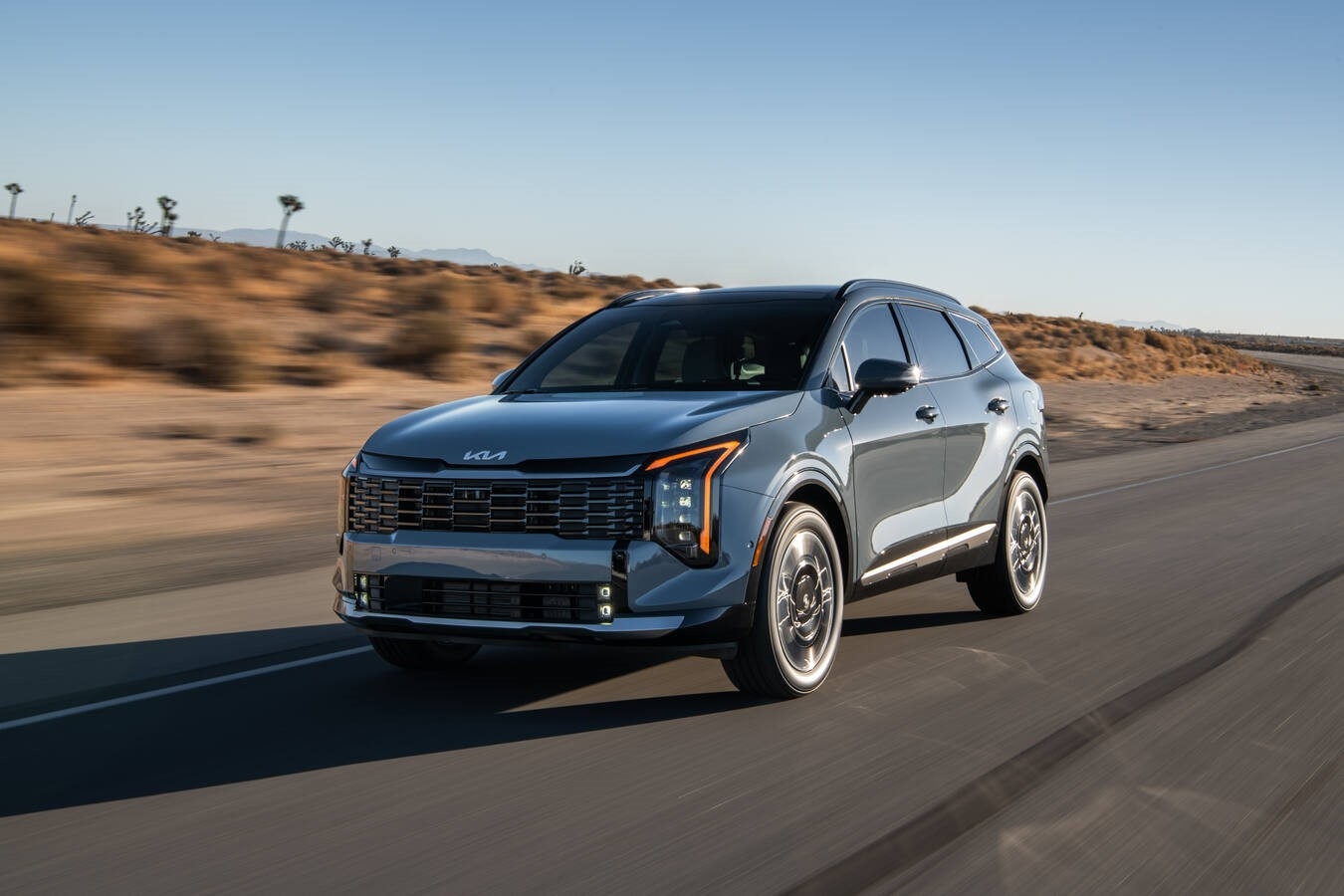 Kia Sportage Hybrid interior touchscreen and Drive Wise driver assistance technology