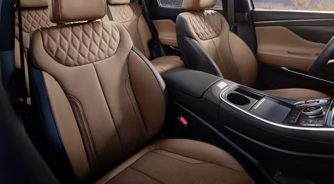 The interior of a 2023 Hyundai Santa fe SUV, showcasing modern design, spacious seating, and advanced technology features.