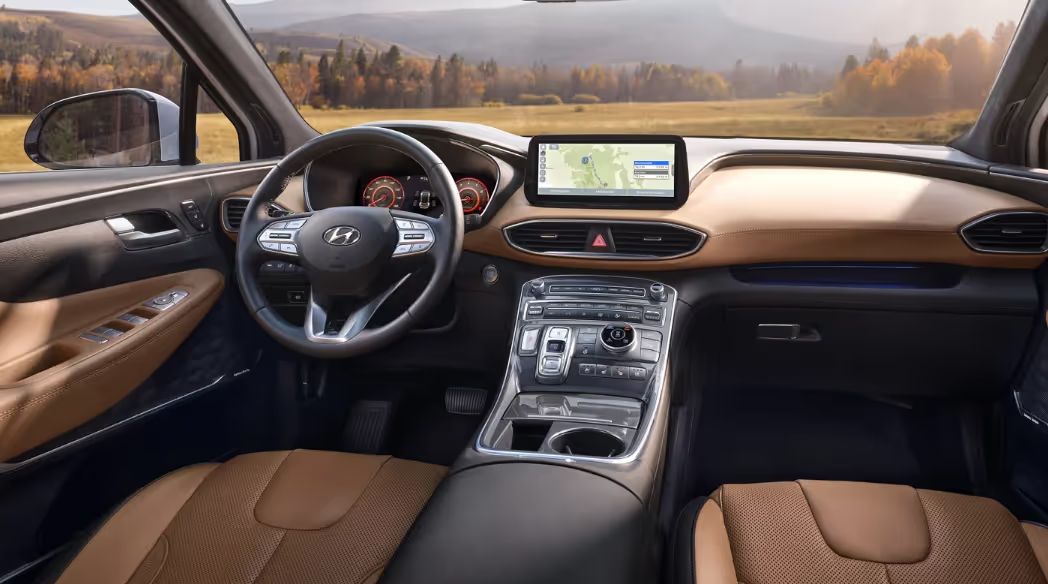 The interior and cabin of a 2023 Hyundai Santa fe SUV, showcasing modern design, spacious seating, and advanced technology features.