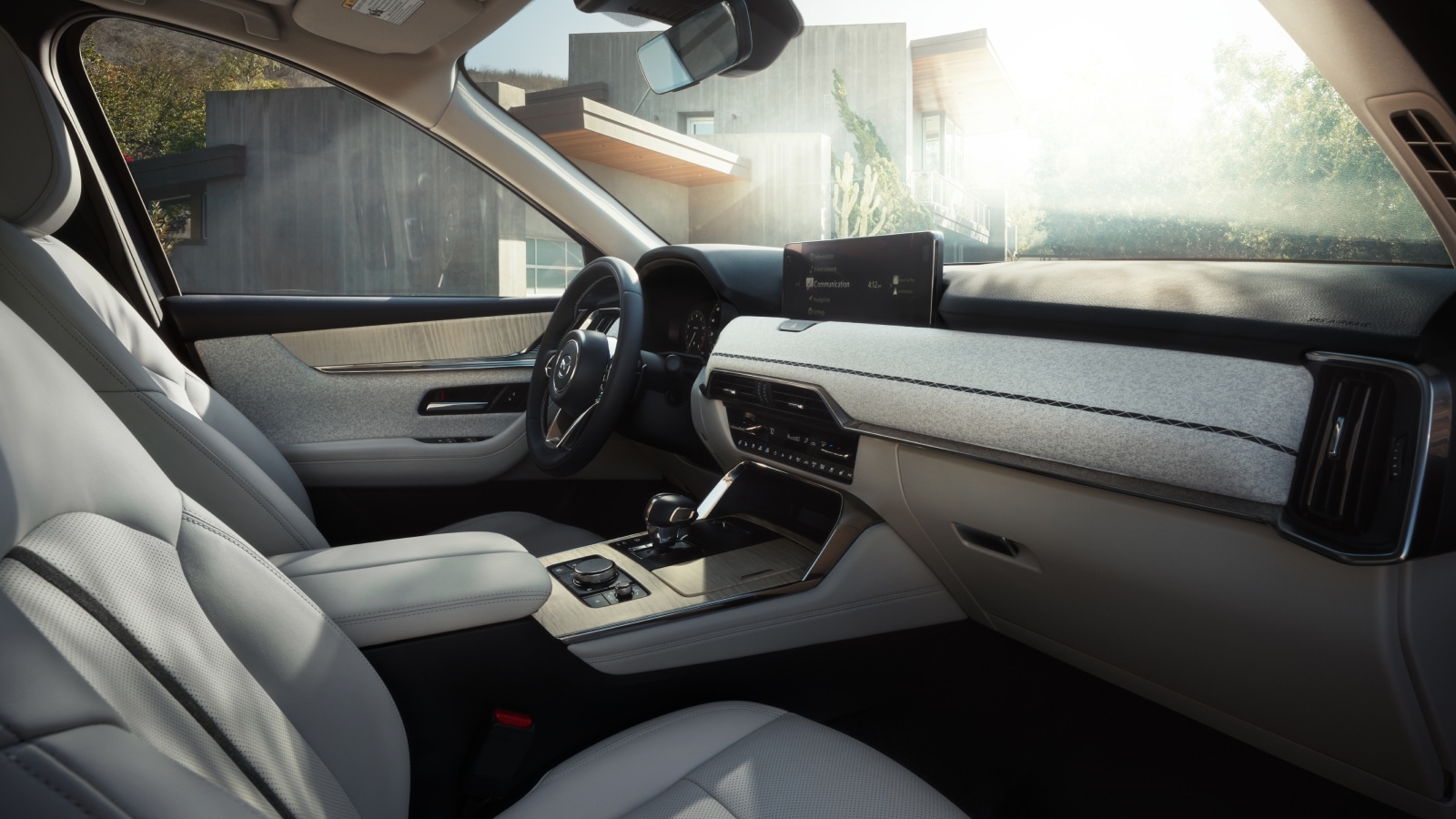 Mazda CX-90 PHEV interior with three rows and driver assistance controls