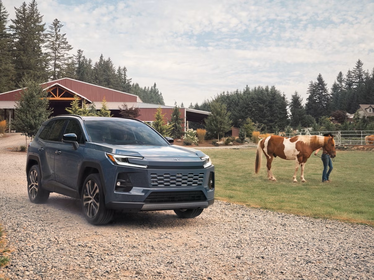 Crossover SUV with elevated driving position on a Southern California road