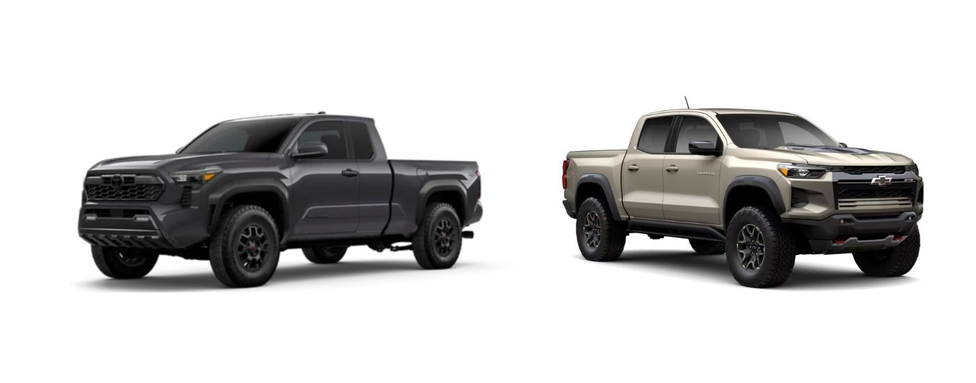 Grey 2026 Toyota Tacoma angled left, and a sand 2026 Chevy Colorado angled right.