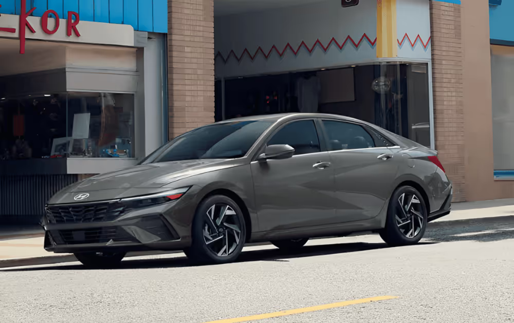2025 Hyundai ELantra Hybrid parked in front of a city street
