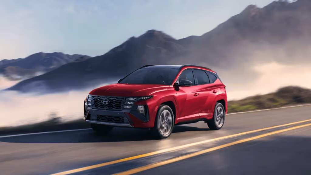 A rugged 2025 Hyundai Tucson Hybrid poised for mountain adventures, showcasing its robust design and efficiency.